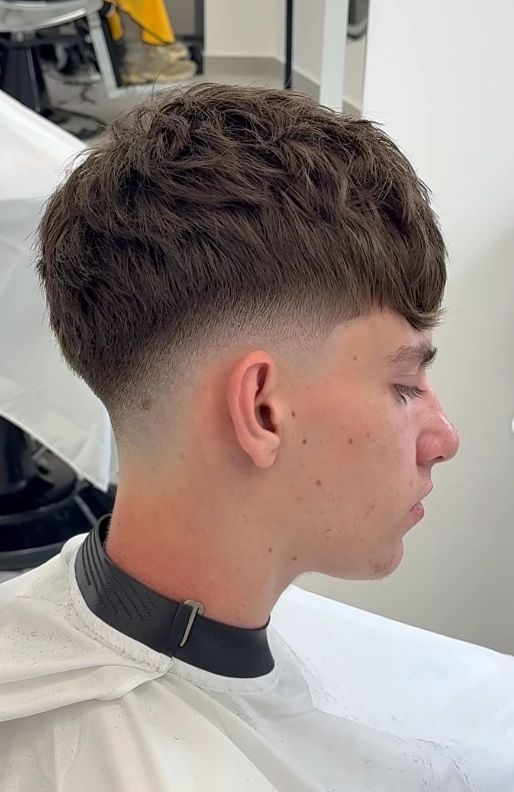 Fresh textured crop and skin fade on a client at ELEMENT Barbershop